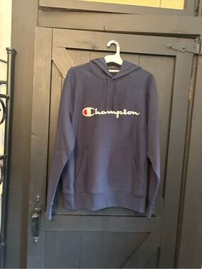 Champion Navy Hoodie with White Script and Red Emblem